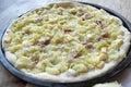 Pizza with potatoes and ooked ham