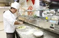 Pizza preparing in kitchen