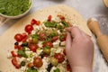 Chef adding spices to his pizza Royalty Free Stock Photo