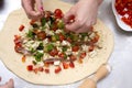 Chef adding anchovy to his pizza Royalty Free Stock Photo