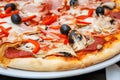 Pizza with red fresh paprika and black olives Royalty Free Stock Photo