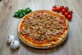 Pizza with red sauce, pulled porc, green olives top angle Royalty Free Stock Photo