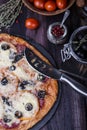 Pizza with salami, mozzarella, olives and basil Royalty Free Stock Photo