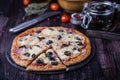 Pizza with salami, mozzarella, olives and basil Royalty Free Stock Photo