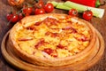 Pizza with salami, pastrami, ham and cheese Royalty Free Stock Photo