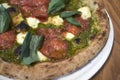 Pizza with salami and pesto Royalty Free Stock Photo