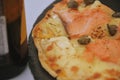 Pizza Salmon Margherita or Margarita with Mozzarella cheese, tomato, olive. Italian pizza Royalty Free Stock Photo