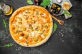 pizza with salmon and mussels on a light background, Mediterranean cuisine, Restaurant menu, dieting, cookbook recipe top view