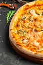 pizza with salmon and mussels on a light background, Mediterranean cuisine, Restaurant menu, dieting, cookbook recipe top view