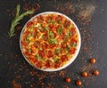 Pizza with sausage and cilantro, ready to eat Royalty Free Stock Photo