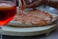 Pizza is a savory gastronomic product that is made up of a dough made from flour, water and yeast that is flattened and seasoned t Royalty Free Stock Photo