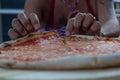 Pizza is a savory gastronomic product that is made up of a dough made from flour, water and yeast that is flattened and seasoned t