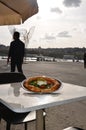 Pizza and shadow human silhouette, a taste I can& x27;t stop eating