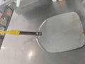 Pizza shovel made of metal top view Royalty Free Stock Photo