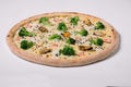 Pizza with shrimp, mussels and broccoli isolated Royalty Free Stock Photo