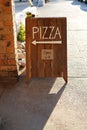 Pizza sign outside Pizza restaurant