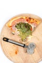 Pizza slice with lettuce and tomato and copy space over white background Royalty Free Stock Photo