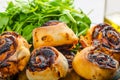 Pizza snails, minipizza with salad and parmagio Royalty Free Stock Photo