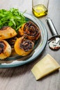 Pizza snails, minipizza with salad and parmagio Royalty Free Stock Photo
