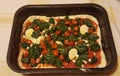 Pizza spinaci e pomodorini