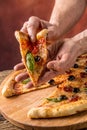 Pizza. Tasty fresh italian pizza served on old wooden table. A p Royalty Free Stock Photo