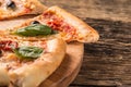 Pizza. Tasty fresh italian pizza served on old wooden table Royalty Free Stock Photo