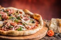 Pizza. Tasty fresh italian pizza served on old wooden table Royalty Free Stock Photo