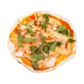 Pizza with tomato sauce, fried shrimp, cream sauce, fresh arugula leaves and basil isolated on white background Royalty Free Stock Photo