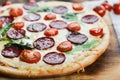 Tasty Pizza With Tomato Sauce, Pepperoni Sausage, And Mushrooms On Wooden Background Natural Rustic, A Pizza Cutter And Ingridient Royalty Free Stock Photo