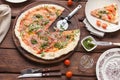 Pizza with tomatoes and pesto sauce Royalty Free Stock Photo