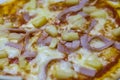 Pizza topped with pineapple Royalty Free Stock Photo