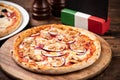 Pizza with tuna fish on a wooden board Royalty Free Stock Photo