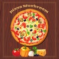 Pizza on the wood background with ingredients.