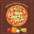 Pizza on the wood background with ingredients. Royalty Free Stock Photo