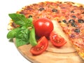 Pizza on wooden plate