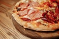 Pizza on wooden table top view. Fast food. Post blog social media. with copy space. Pizza ready to eat