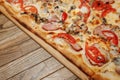 Pizza on wooden table top view. Fast food. Post blog social media. with copy space. Pizza ready to eat