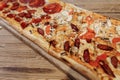 Pizza on wooden table top view. Fast food. Post blog social media. with copy space. Pizza ready to eat