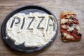 Pizza word written on the flour