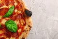 Pizzaa pepperoni background. pizza with meat and basil top view Royalty Free Stock Photo