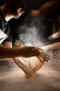 Pizzaiolo& x27;s hands before make a dough before preparing a delicious pizza