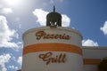 Pizzeria and grill. Lettering on a round building
