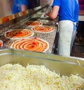 Pizzeria. particular. pizza chef at work while creating his wonderful pizzas.