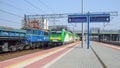 PKP cargo locomotives and passenger train on Warszawa Gdanska terminal. Royalty Free Stock Photo