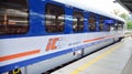 PKP Intercity Polish train sleeping car at station platform awaiting departure in late afternoon Royalty Free Stock Photo