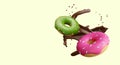 Placard with yellow background and place for text. Realistic donuts with green and pink cream