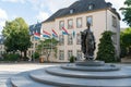 The Place Clairefontaine with flags of Luxembourg and statue of Grand Duchess Charlotte of Luxembourg