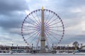 Place de la Concorde at sunset. Ferris wheel and Egyptian obelisk. Paris France