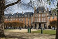 Place des Vosges (Place Royale) in springtime, the oldest planned square in Paris