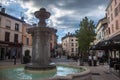 Place du 23 Aout 1944 Square, a pedestrian square with a fountain, in the center of Bourgoin, a typical town of French Dauphine